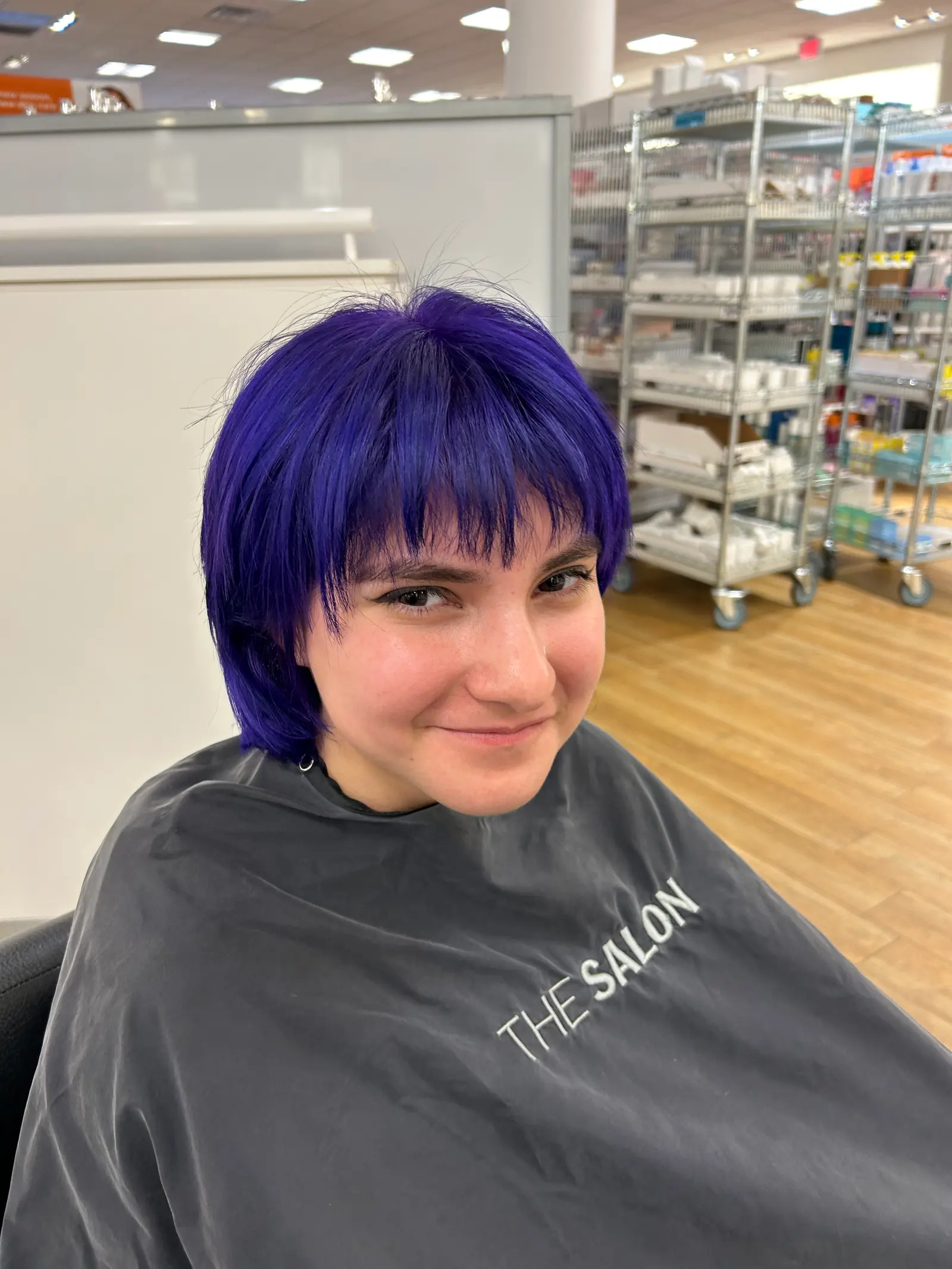Vivid purple bob with a straight fringe